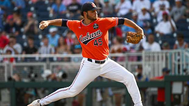Jun 18, 2022; Omaha, NE, USA; Auburn Tigers starting pitcher Joseph Gonzalez (45) throws against the Ole Miss Rebels in the first inning at Charles Schwab Field. Mandatory Credit: Steven Branscombe-USA TODAY Sports