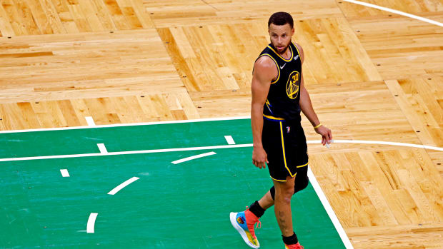 Steph Curry wears #RetireInequality shoes in Game 3 of the 2022 NBA Finals.