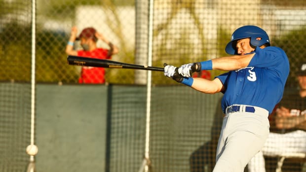 May 13, 2021; Scottsdale, Arizona, USA; Israel's Ian Kinsler connects on a pitch against Beimel Elite Athletics during a game at Salt River Fields at Talking Stick. Patrick Breen-Arizona Republic High School Baseball