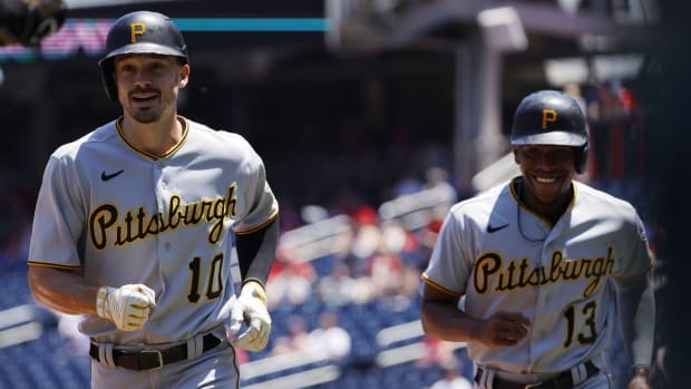 Jun 29, 2022; Washington, District of Columbia, USA; Pittsburgh Pirates center fielder Bryan Reynolds (10) celebrates with Pirates third baseman Ke'Bryan Hayes (13) after hitting a two run home run against the Washington Nationals during the first inning at Nationals Park. Mandatory Credit: Geoff Burke-USA TODAY Sports