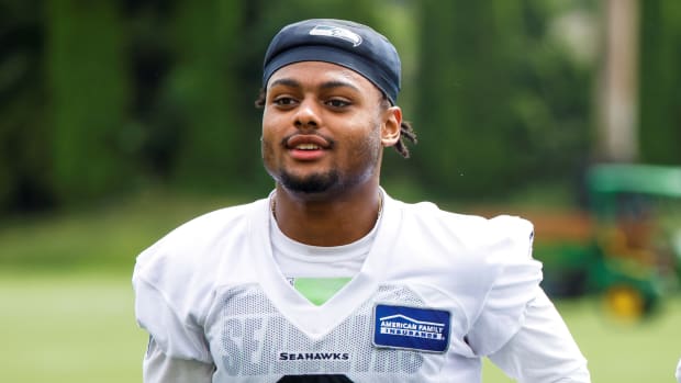 Seattle Seahawks cornerback Coby Bryant (8) jogs to the locker room following minicamp practice at the Virginia Mason Athletic Center Field