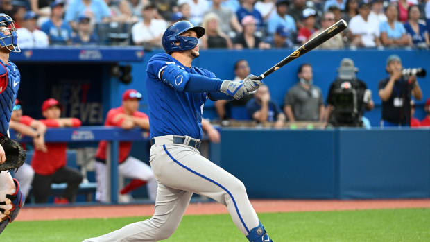 Jul 16, 2022; Toronto, Ontario, CAN; Kansas City Royals designated hitter Vinnie Pasquantino (9) hits a two-run home run against the Toronto Blue Jays in the 10th inning at Rogers Centre. Mandatory Credit: Dan Hamilton-USA TODAY Sports