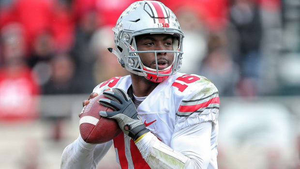 Ohio State quarterback J.T. Barrett drops back to throw a pass.