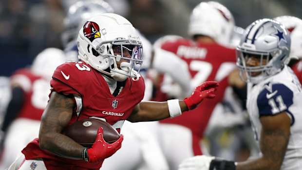 Arizona Cardinals Greg Dortch (83) runs the ball in the second quarter against the Dallas Cowboys at AT&T Stadium. Mandatory Credit: Tim Heitman-USA TODAY Sports