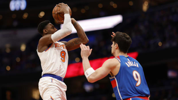 New York Knicks guard RJ Barrett (9) shoots the ball over Washington Wizards forward Deni Avdija (9) in the first quarter at Capital One Arena.