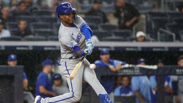 Jul 29, 2022; Bronx, New York, USA; Kansas City Royals shortstop Maikel Garcia (11) hits a single in the fifth inning against the New York Yankees at Yankee Stadium. Mandatory Credit: Wendell Cruz-USA TODAY Sports