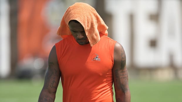 Deshaun Watson with a towel over his head at Browns camp