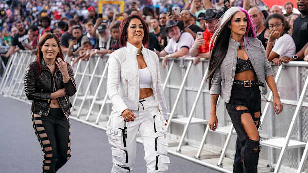 Iyo Sky, Bayley and Dakota Kai entering at SummerSlam
