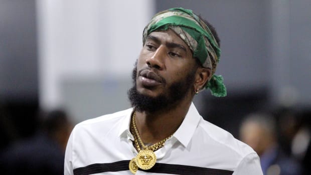 Former NBA guard Iman Shumpert arrives at an arena before a game.