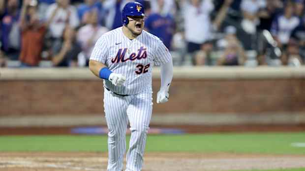 Mets DH Daniel Vogelbach celebrates a home run.