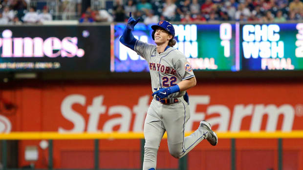 Aug 17, 2022; Atlanta, Georgia, USA; New York Mets third baseman Brett Baty (22) celebrates after a home run in his first career at-bat against the Atlanta Braves in the first inning at Truist Park.