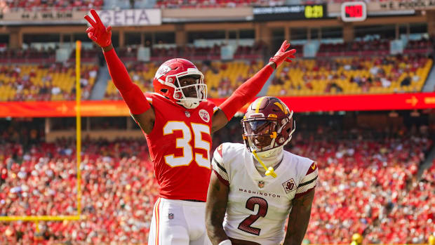Aug 20, 2022; Kansas City, Missouri, USA; Kansas City Chiefs cornerback Jaylen Watson (35) celebrates after breaking up a pass intended for Washington Commanders wide receiver Dyami Brown (2) during the first half at GEHA Field at Arrowhead Stadium. Mandatory Credit: Jay Biggerstaff-USA TODAY Sports
