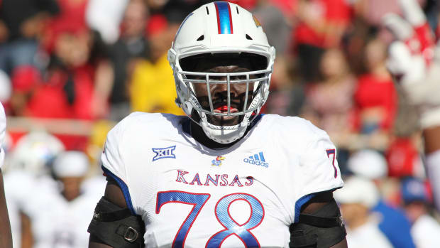 Oct 20, 2018; Lubbock, TX, USA; Kansas Jayhawks offensive tackle Hakeem Adeniji (78) waits on the next play against the Texas Tech Red Raiders at Jones AT&T Stadium. Mandatory Credit: Michael C. Johnson-USA TODAY Sports