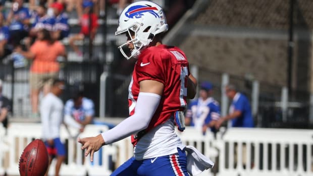 Bills punter Matt Araiza punts a ball in practice during training camp.