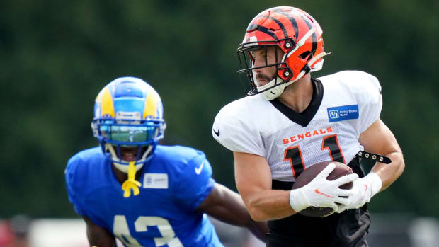 Cincinnati Bengals wide receiver Trent Taylor (11) turns downfield after completing a catch as Los Angeles Rams safety Russ Yeast II (43) defends during a joint practice, Wednesday, Aug. 24, 2022, at the Paycor Stadium practice fields in Cincinnati. Los Angeles Rams At Cincinnati Bengals Joint Practice Aug 24 0067