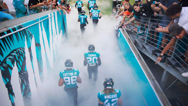 Jacksonville Jaguars safety Daniel Thomas #20, wide receiver Jeff Cotton Jr. #88 and safety Andrew Wingard #42 run from the tunnel to the field before anduring the first quarter of an NFL preseason game Saturday, Aug. 20, 2022 at TIAA Bank Field in Jacksonville. [Corey Perrine/Florida Times-Union] Jki 082022 Jags Vs Steelers Cp 73