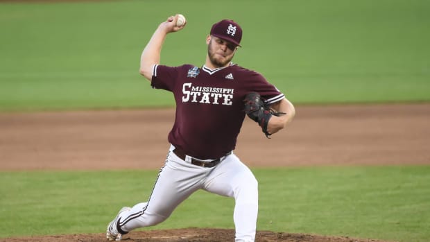 Landon Sims throws a pitch for Mississippi State in the 2021 College World Series.