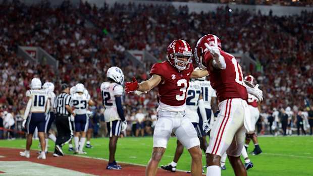 Jermaine Burton and Traeshon Holden celebrate a touchdown
