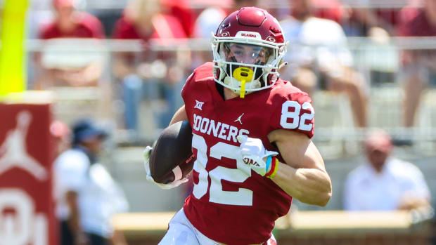 Oklahoma Sooners wide receiver Gavin Freeman catches a pass during a college football game in the SEC.