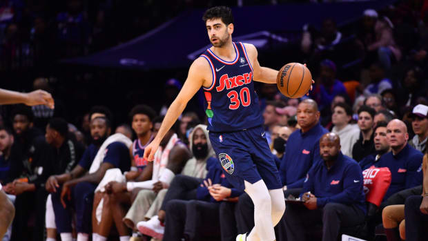 Apr 10, 2022; Philadelphia, Pennsylvania, USA; Philadelphia 76ers guard Furkan Korkmaz (30) controls the ball in the second quarter against the Detroit Pistons at Wells Fargo Center.