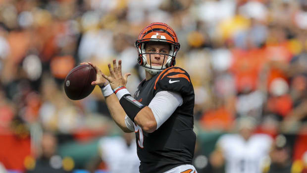 Sep 11, 2022; Cincinnati, Ohio, USA; Cincinnati Bengals quarterback Joe Burrow (9) throws a pass against the Pittsburgh Steelers in the first half at Paycor Stadium. Mandatory Credit: Katie Stratman-USA TODAY Sports