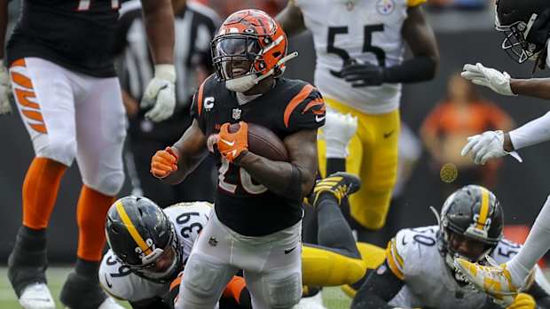 Sep 11, 2022; Cincinnati, Ohio, USA; Pittsburgh Steelers safety Minkah Fitzpatrick (39) tackles Cincinnati Bengals running back Joe Mixon (28) in overtime at Paycor Stadium. Mandatory Credit: Katie Stratman-USA TODAY Sports