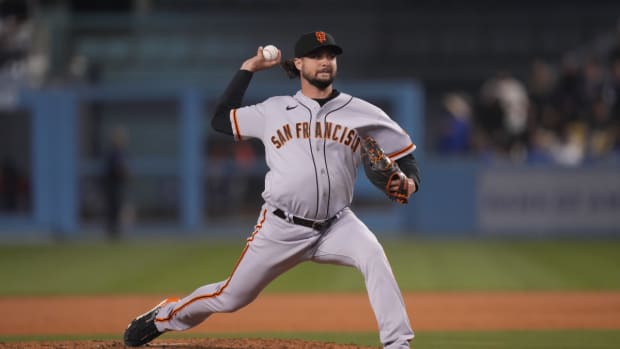 SF Giants pitcher Tyler Beede throws a pitch during spring training.
