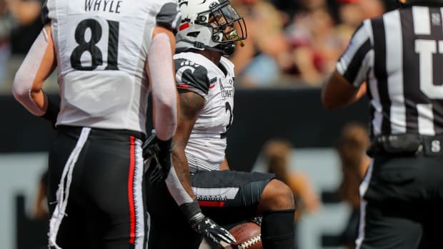 Sep 17, 2022; Cincinnati, Ohio, USA; Cincinnati Bearcats running back Corey Kiner (2) reacts after scoring a touchdown against the Miami Redhawks in the first half at Paycor Stadium. Mandatory Credit: Katie Stratman-USA TODAY Sports