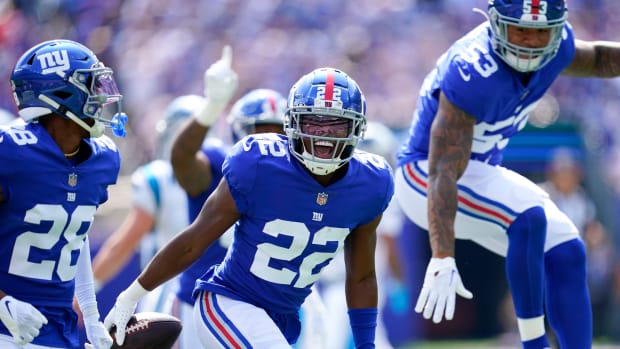 New York Giants cornerback Adoree' Jackson (22) recovers the ball on a Carolina Panther turnover during an NFL game at MetLife Stadium on Sunday, Sept. 18, 2022, in East Rutherford.