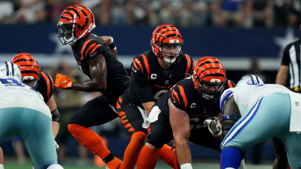 Cincinnati Bengals quarterback Joe Burrow (9) readies for the snap as Cincinnati Bengals wide receiver Ja'Marr Chase (1) moves in motion in the second quarter of an NFL Week 2 game against the Dallas Cowboys, Sunday, Sept. 18, 2022, at AT&T Stadium in Arlington, Texas. Nfl Cincinnati Bengals At Dallas Cowboys Sept 18 2364