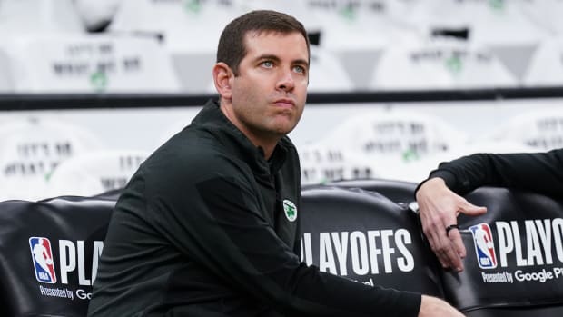Celtics President of Basketball Operations Brad Stevens on the court sideline before the start of a game.