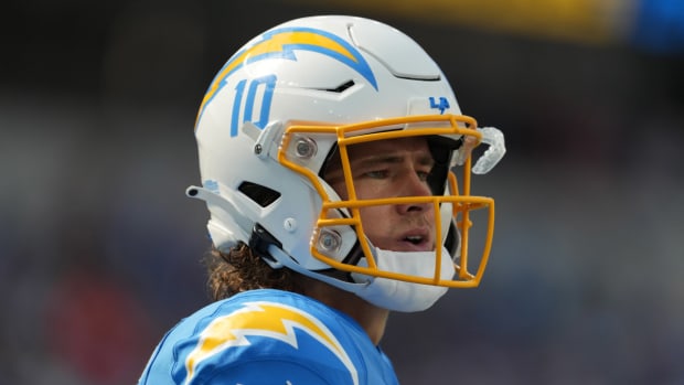 Sep 11, 2022; Inglewood, California, USA; Los Angeles Chargers quarterback Justin Herbert (10) reacts in the second half against the Las Vegas Raiders at SoFi Stadium. Mandatory Credit: Kirby Lee-USA TODAY Sports