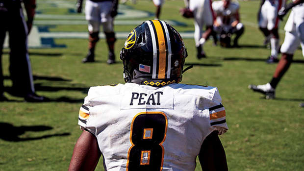 Missouri running back Nathaniel Peat reflects after fumble at the goal line.