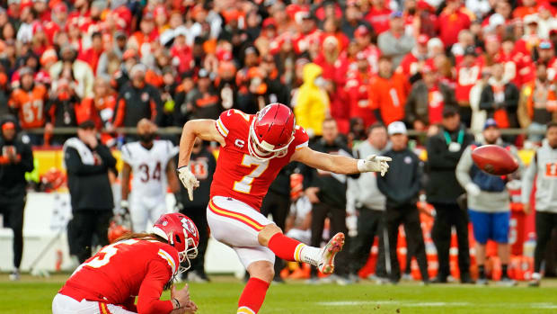 Jan 30, 2022; Kansas City, Missouri, USA; Kansas City Chiefs kicker Harrison Butker (7) kicks a field goal against the Cincinnati Bengals during the fourth quarter of the AFC Championship Game to send the game into overtime at GEHA Field at Arrowhead Stadium. The Cincinnati Bengals won 27-24. Mandatory Credit: Jay Biggerstaff-USA TODAY Sports