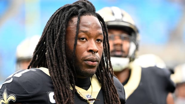 Saints running back Alvin Kamara looks on without a helmet during the Saints game vs. Carolina.