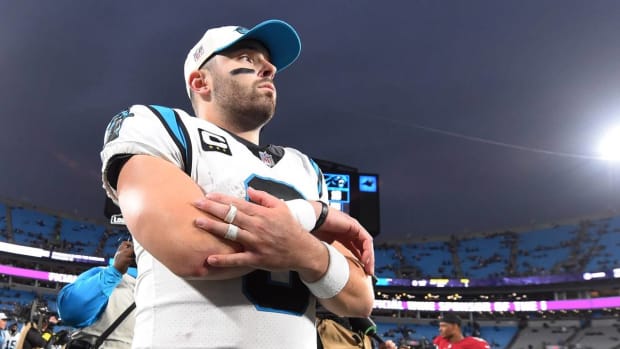 Baker Mayfield looks on after losing a game vs. the Arizona Cardinals at home.