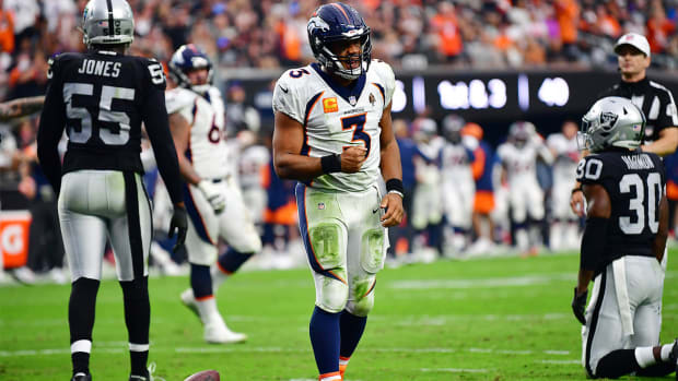 Oct 2, 2022; Paradise, Nevada, USA; Denver Broncos quarterback Russell Wilson (3) celebrates his touchdown scored against the Las Vegas Raiders during the second half at Allegiant Stadium.