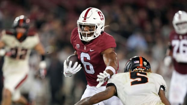 Stanford Cardinal wide receiver Elijah Higgins (6) runs after a catch against Oregon State Beavers defensive back Alex Austin (5) during the second quarter at Stanford Stadium. Mandatory Credit:
