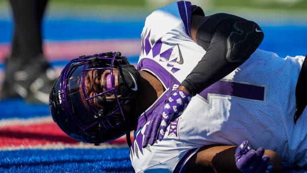 Oct 8, 2022; Lawrence, Kansas, USA; TCU Horned Frogs cornerback Tre'Vius Hodges-Tomlinson (1) reacts after an injury during the second half against the Kansas Jayhawks at David Booth Kansas Memorial Stadium. Mandatory Credit: Jay Biggerstaff-USA TODAY Sports