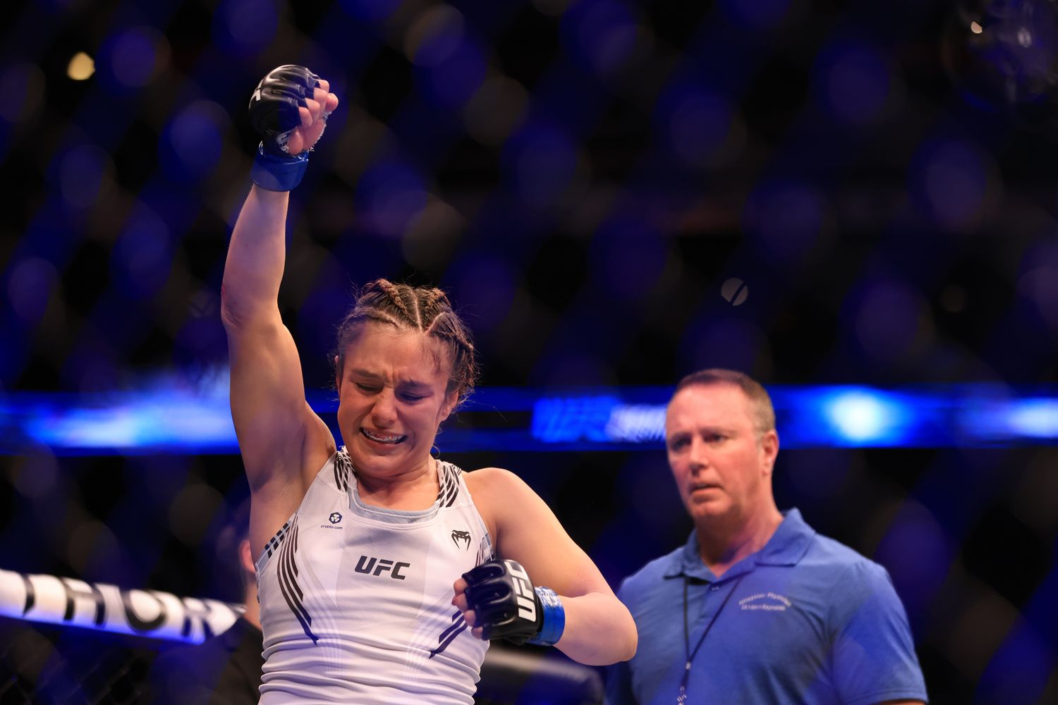 Alexa Grasso (blue gloves) reacts to defeating Joanne Wood (red gloves) during UFC Fight Night at Nationwide Arena.