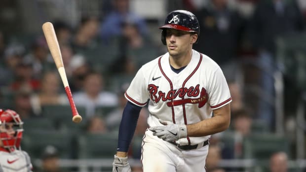 Oct 12, 2022; Atlanta, Georgia, USA; Atlanta Braves first baseman Matt Olson (28) tosses his bat after he draws a walk against the Philadelphia Phillies in the eighth inning during game two of the NLDS for the 2022 MLB Playoffs at Truist Park. Mandatory Credit: Brett Davis-USA TODAY Sports