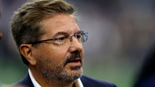 Washington Commanders owner Dan Snyder on the field before the game against the Dallas Cowboys at AT&T Stadium.