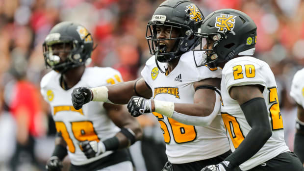 Sep 10, 2022; Cincinnati, Ohio, USA; Kennesaw State Owls defensive lineman Demetric Barnes (56) reacts after a turnover by the Cincinnati Bearcats in the first half at Nippert Stadium.