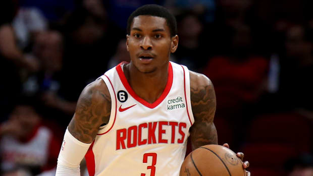 Rockets guard Kevin Porter Jr. dribbles the ball during a preseason game against the Raptors.