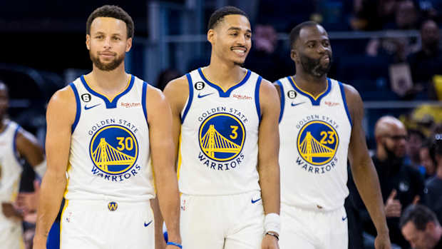 Stephen Curry, Jordan Poole and Draymond Green