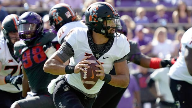 Oct 15, 2022; Fort Worth, Texas, USA; Oklahoma State Cowboys quarterback Spencer Sanders (3) during a game against the TCU Horned Frogs at Amon G. Carter Stadium.