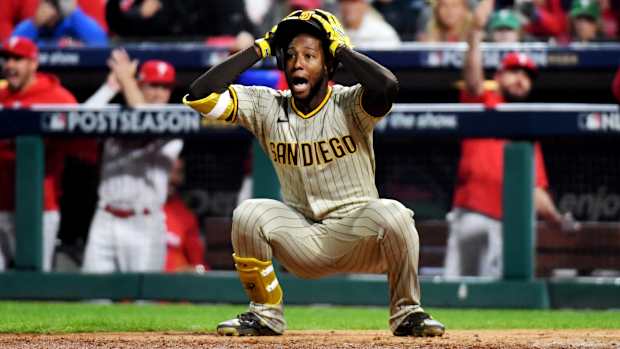 Jurickson Profar reacts after third base umpire Todd Tichenor calls him out for not checking his swing.