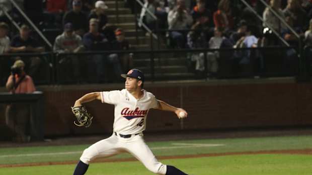Drew Nelson pitching for Auburn baseball.