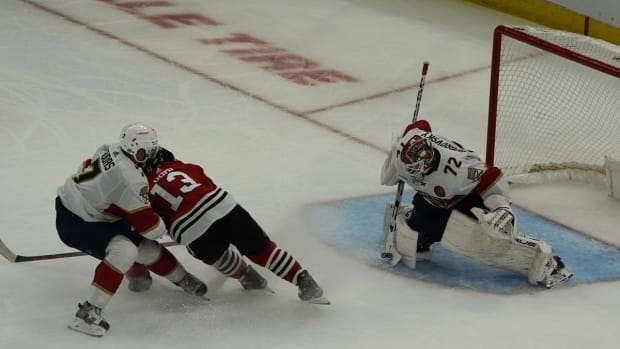 Oct 25, 2022; Chicago, Illinois, USA; Florida Panthers goaltender Sergei Bobrovsky (72) makes a save on Chicago Blackhawks center Max Domi (13) during the second period at United Center. Mandatory Credit: David Banks-USA TODAY Sports