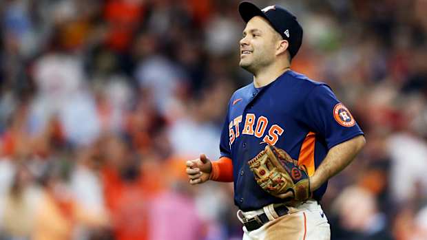 Jose Altuve runs off the field